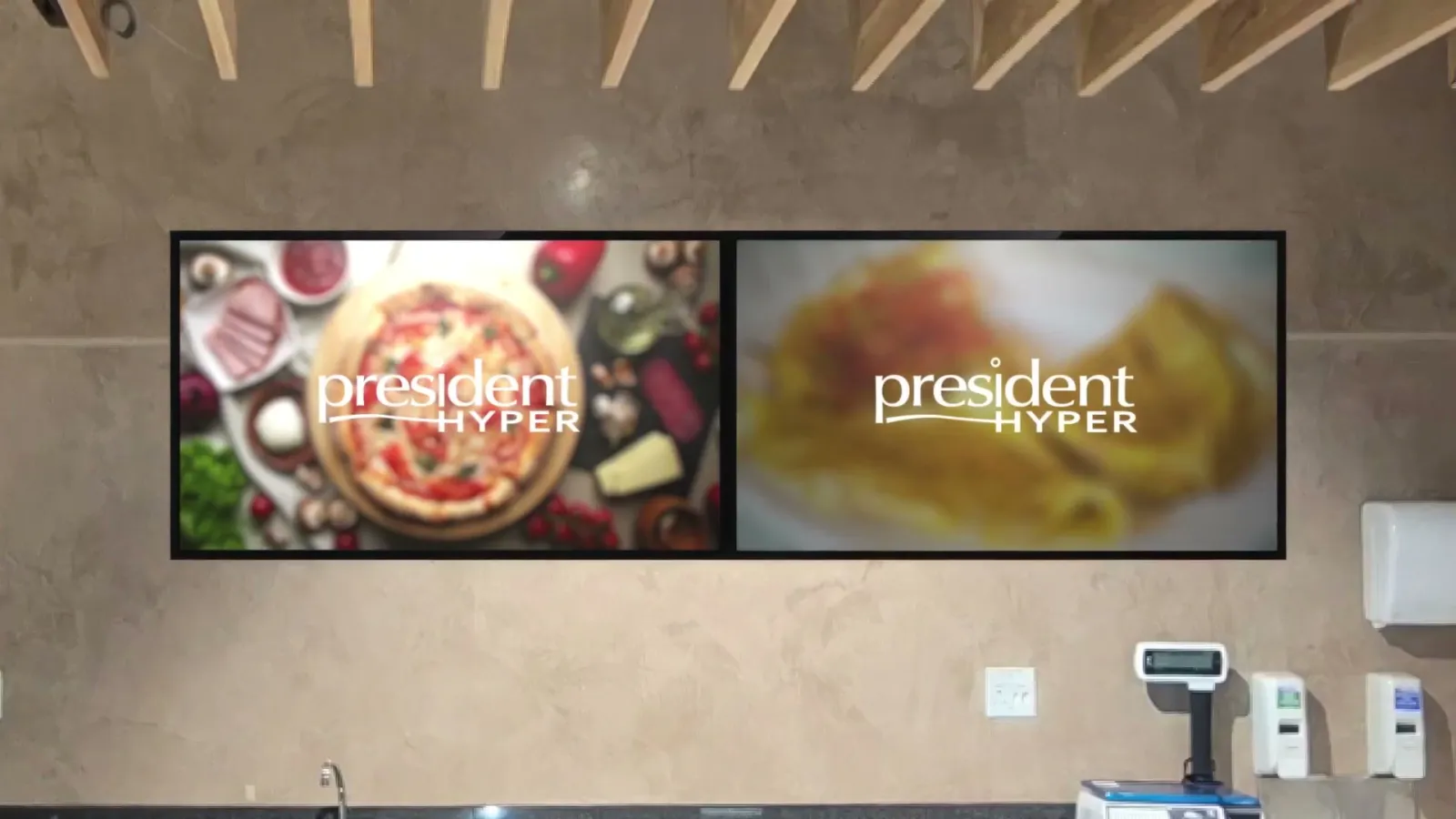 Two menu screens on a wall at President Hyper