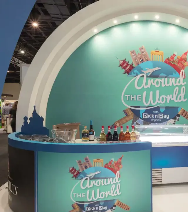 A Pick n Pay trade show stand with an Around the World theme