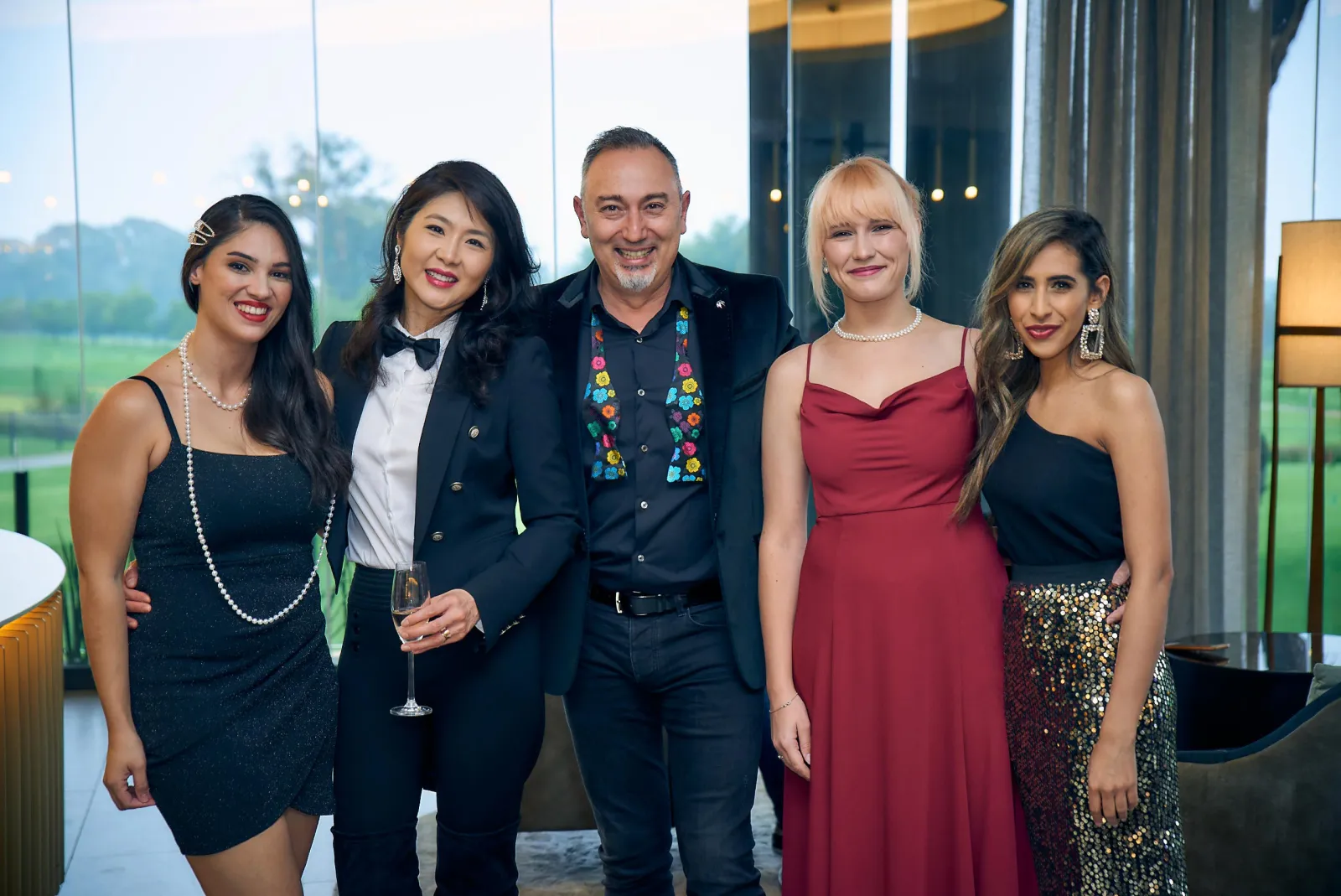 Five of the Magos team dressed for an evening event
