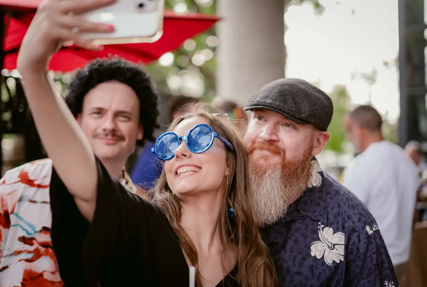 Two of the team taking a selfie at a seventies-themed party